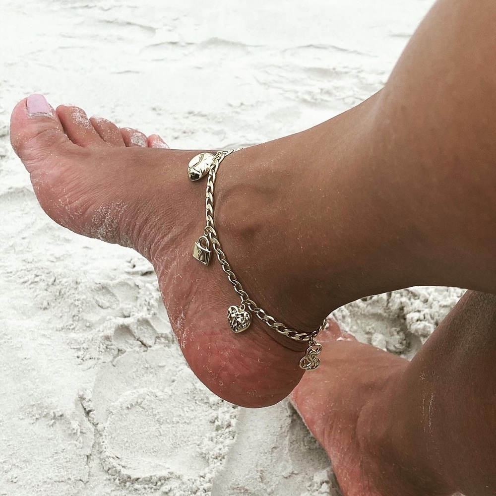 10 inch gold tone anklet with charms